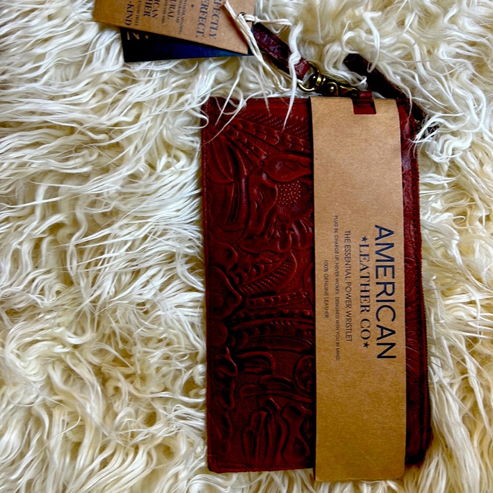 Leather hand pouch with battery charger for your phone case